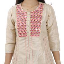 Golden kurti with pink embroidery work