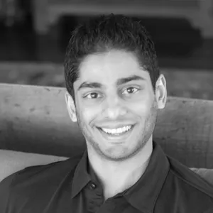 Black and white headshot of Nevin Shetty