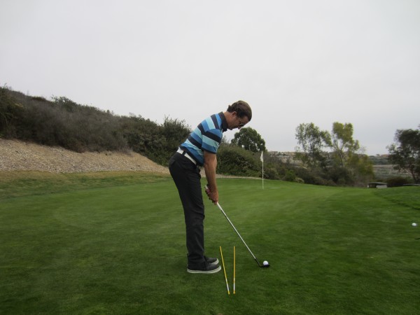 Note the Square Club Face, but Open Stance.