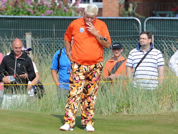 Golfer John Daly takes a break on the 1sr green at Hoylake.