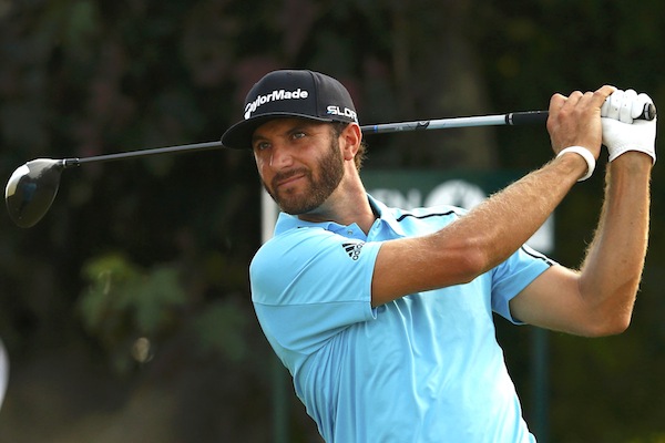 Dustin Johnson of the U.S. watches his tee shot during the second round of the British Open Championship at the Royal Liverpool Golf Club in Hoylake