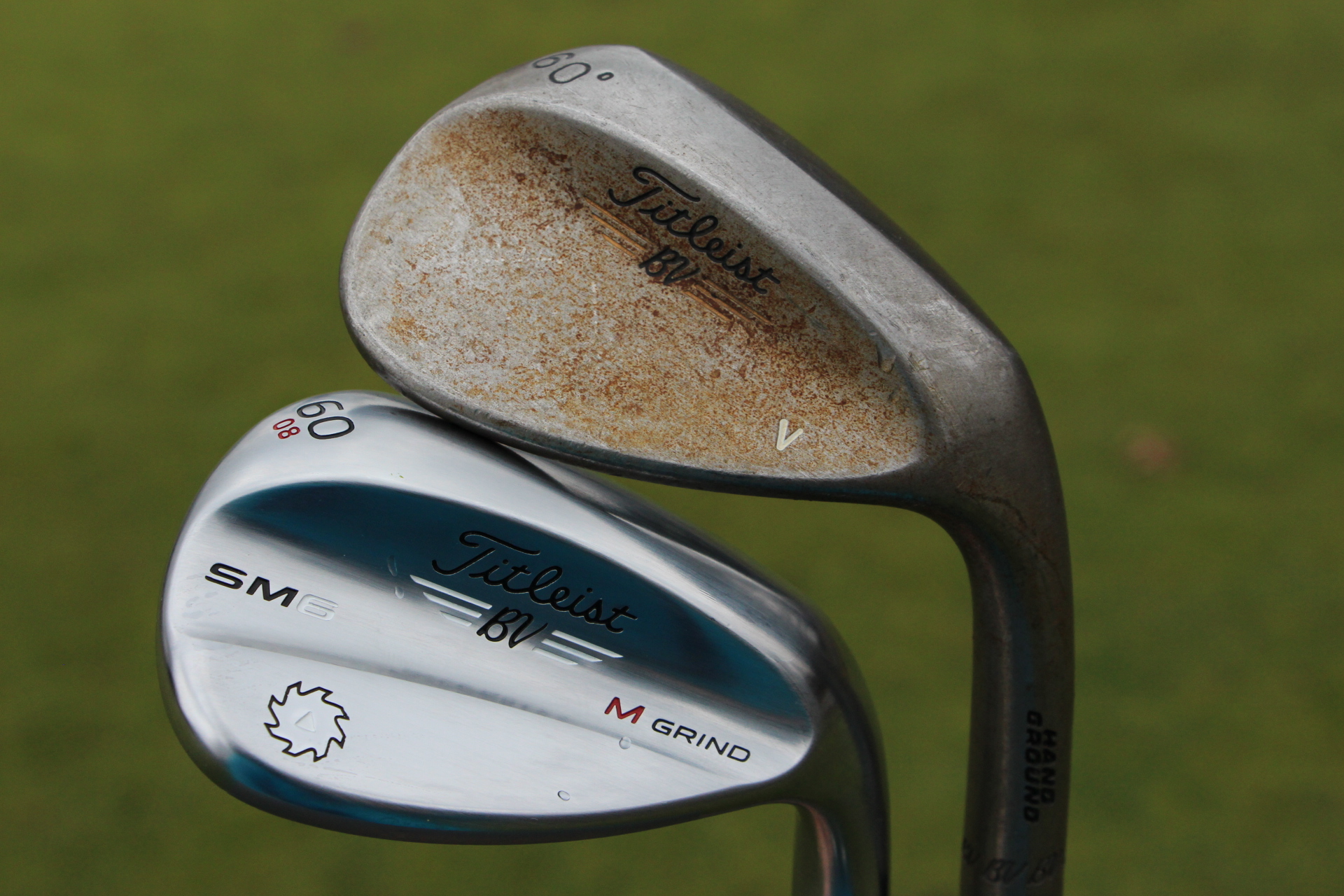 A Vokey Hand Ground wedge with a raw finish (above). 