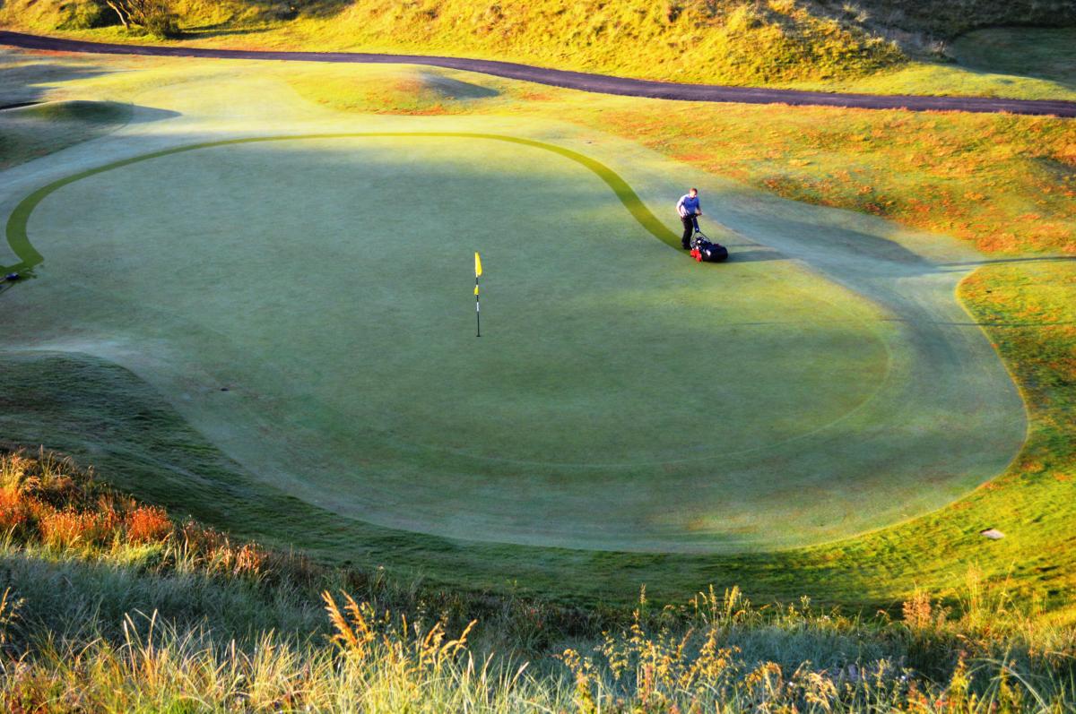 Cutting the 3rd green at Portstewart