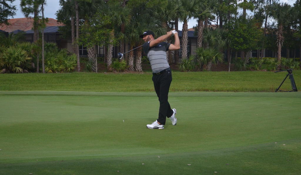 D. Johnson hitting drivers off a green whilewearing the new Tour360 shoes during a commercial shoot
