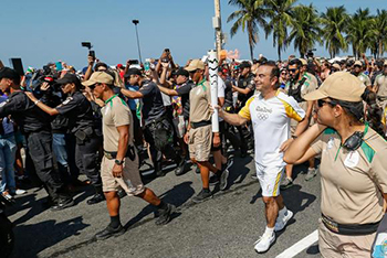 Carlos Ghosn carries the torch for the Rio de Janeiro  Olympic Games.