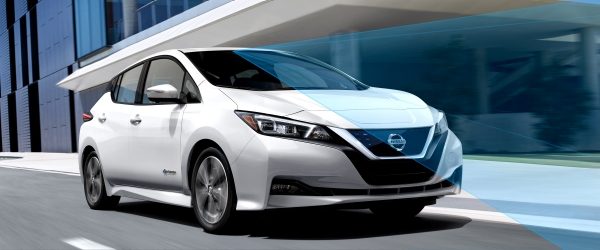 Nissan Leaf in city with driving sensor graphics