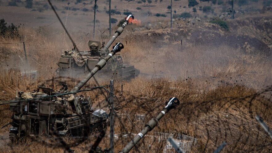 <p>IDF (Israel Defense Force) Artillery Corps seen firing into Lebanon, near the Israeli border with Lebanon, on August 6, 2021. According to the report, the rockets are stashed at the Masyaf area in northwestern Syria, and are due to be transferred to Al-Qusayr in the western part of the country. BASEL AWIDAT/JNS</p>