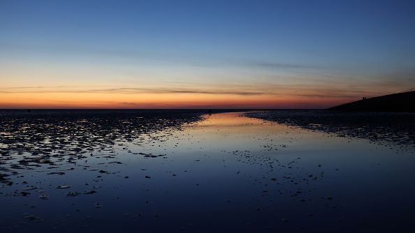 Sunset at Wadden Sea on April 16, 2022 in Büsum, Germany. (Photo by Andreas Rentz/Getty Images)