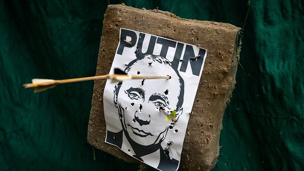 An archery target featuring the face of Russian President Vladimir Putin is seen on a tourist attraction at Shevchenkivskyi Hai Park Museum on April 24, 2022 in Lviv, Ukraine. (Photo by Leon Neal/Getty Images)