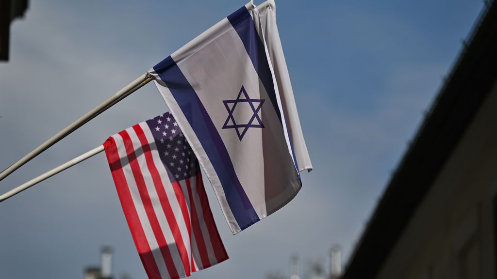 Israeli and U.S. flags seen in Krakow. On Sunday, August 28, 2022, in Krakow, Lesser Poland Voivodeship, Poland. (Photo by Artur Widak/NurPhoto via Getty Images)