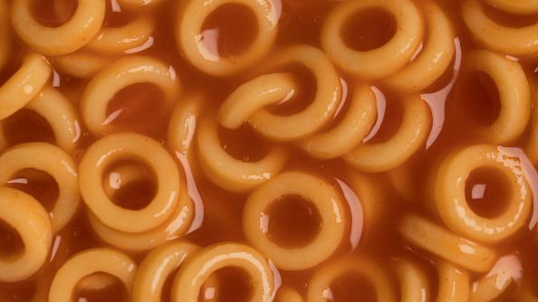 A photo illustration of Spaghetti Hoops in London, England, on February 16, 2018. People tend to eat more ultra processed foods for their energy requirements, hence get obese. DAN KITWOOD/GETTY IMAGES