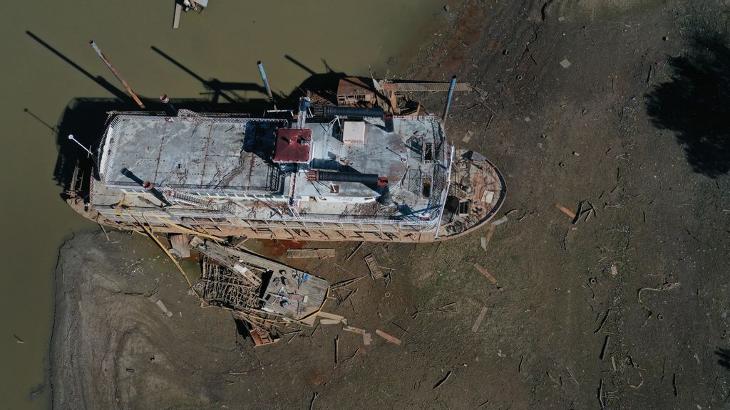 An aerial view shots the Diamond Lady, a once majestic riverboat, resting in mud at Riverside Park Marina in Martin Luther King Jr. Riverside Park along the Mississippi River on October 19, 2022 in Memphis, Tennessee. PHOTO BY SCOTT OLSON VIA GETTY IMAGES