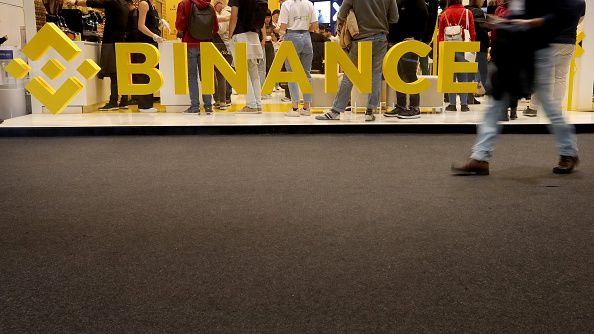 The Binance logo is seen during the 2022 Web Summit in Lisbon, Portugal, on November 4, 2022. The company will liquidate its entire holding of the native token of cryptocurrency exchange FTX. PEDRO FIUZA/NURPHOTO VIA GETTY IMAGES