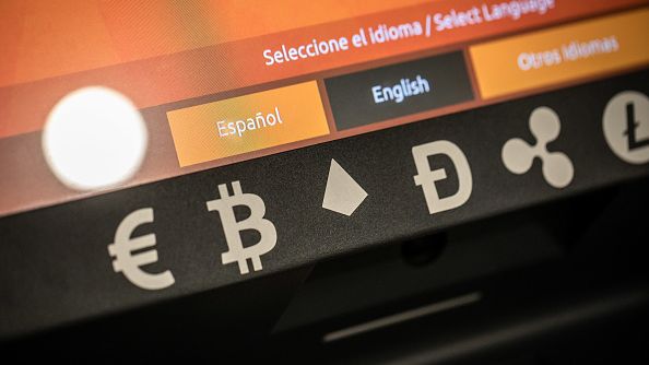 Cryptocurrency logos on an automated teller machine (ATM) inside a cryptocurrency exchange in Barcelona, Spain, on September 8, 2022. ANGEL GARCIA/BLOOMBERG VIA GETTY IMAGES