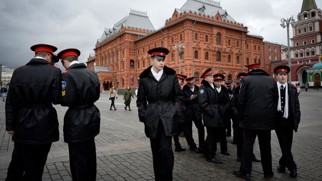 Russian military cadets wait for an excursion at Manezhnaya Square just outside the Kremlin in Moscow on September 26, 2022. Russian high school students will be given military training from next year. NATALIA KOLESNIKOVA/AFP VIA GETTY IMAGES