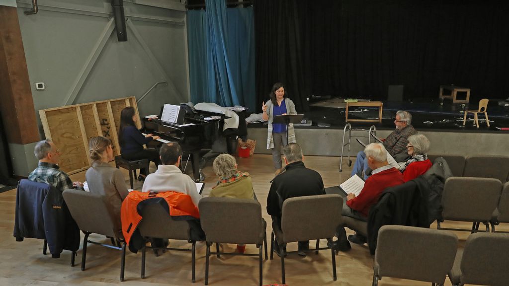 IN FILE - Chorus director Amanda Reopell, center, leads the newly established chorus for Parkinsons patients and their care partners at the South Shore YMCA in Hanover, MA on Feb. 13, 2019. (Photo by David L. Ryan/The Boston Globe via Getty Images)