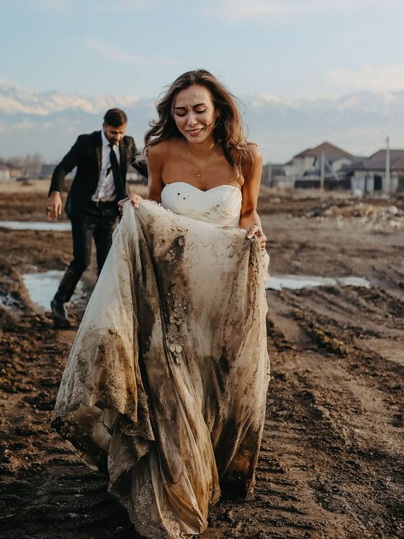 It mud be love: Bride forgives groom for dropping her in slime