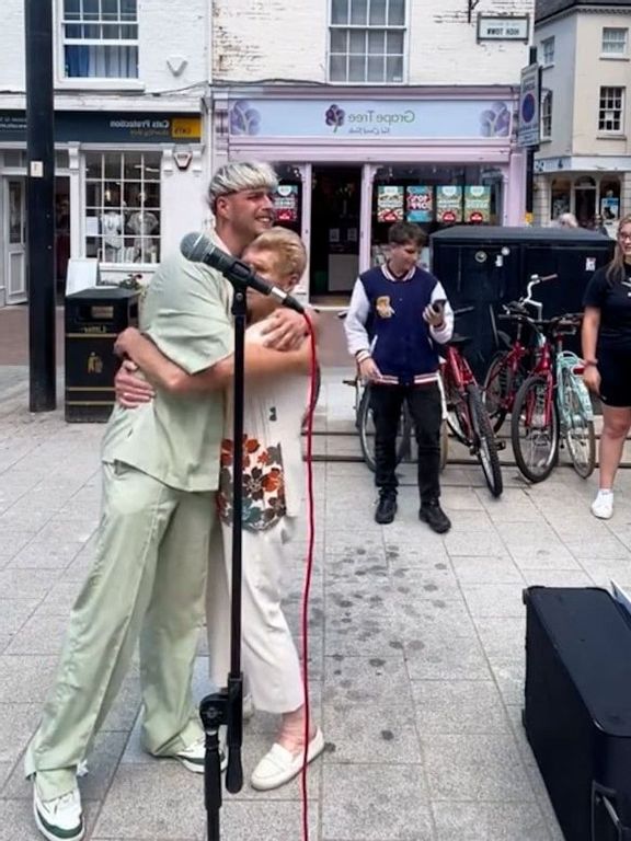 Dancing queen: Elderly woman dancing on the street is a hit