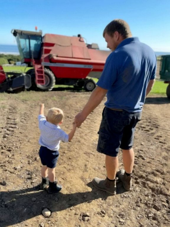 Video: Boy age 3 has a real farm to play with, and even drives a real tractor