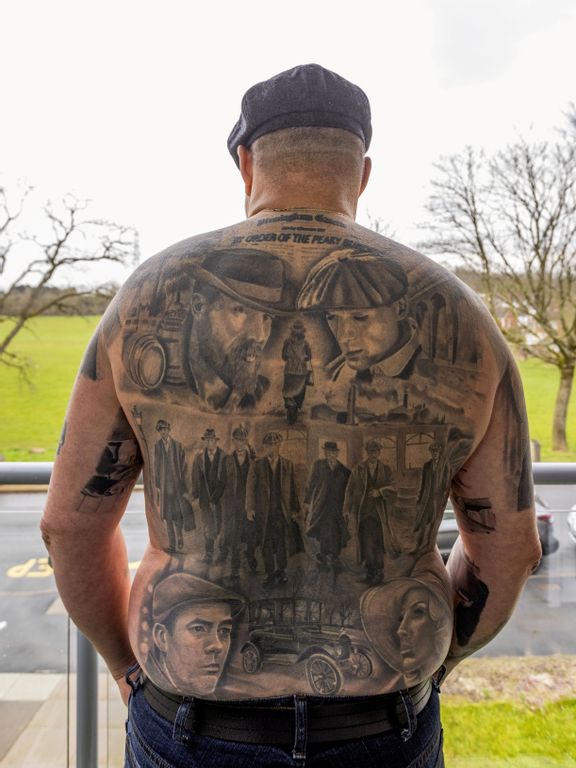 Peaky Blinders' superfan covers back and arms with tattoos devoted