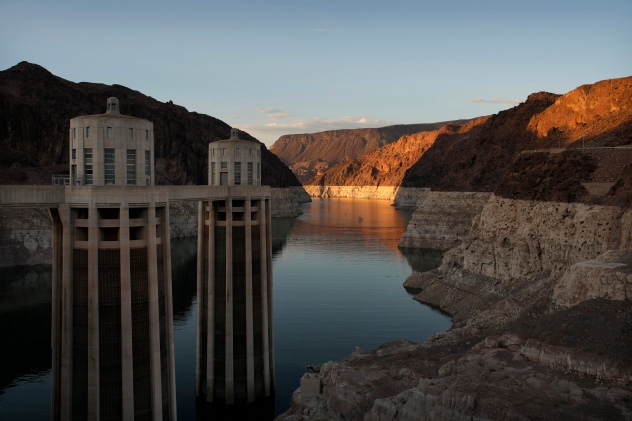 File - A bathtub ring of light minerals shows the high water line of Lake Mead near water intakes on the Arizona side of Hoover Dam at the Lake Mead National Recreation Area on June 26, 2022, near Boulder City, Nev. (AP Photo/John Locher, File)