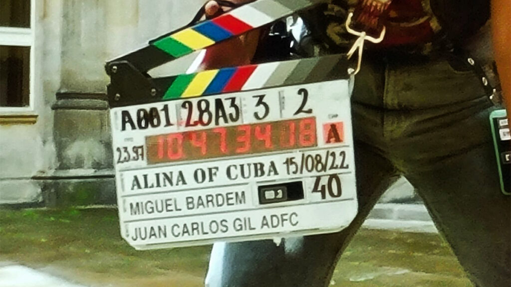 Crew member holding a movie clapboard on the set of Alina de Cuba.  John Martinez O'Felan spoke to LatinHeat in regard to Latino representation. MANKIND ENTERTAINMENT/LATINHEAT