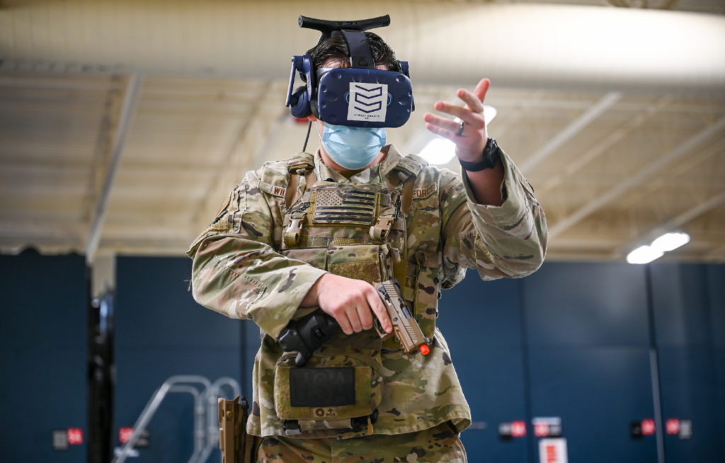 Staff Sgt. Brandon Wilson, 75th Security Forces Squadron, during a de-escalating an armed person scenario using the Street Smarts Virtual Reality system, Oct. 28, 2021 at Hill Air Force Base, Utah. US Military Takes War To The Metaverse With Project Tripoli. CYNTHIA GRIGGS/DVIDS