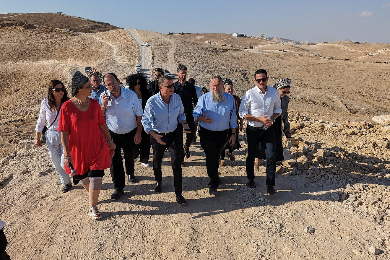 <p>Israeli lawmakers tour an illegal Palestinian city being constructed in the Judean Desert south of Jerusalem, Sept. 21, 2023. COURTESY.</p>