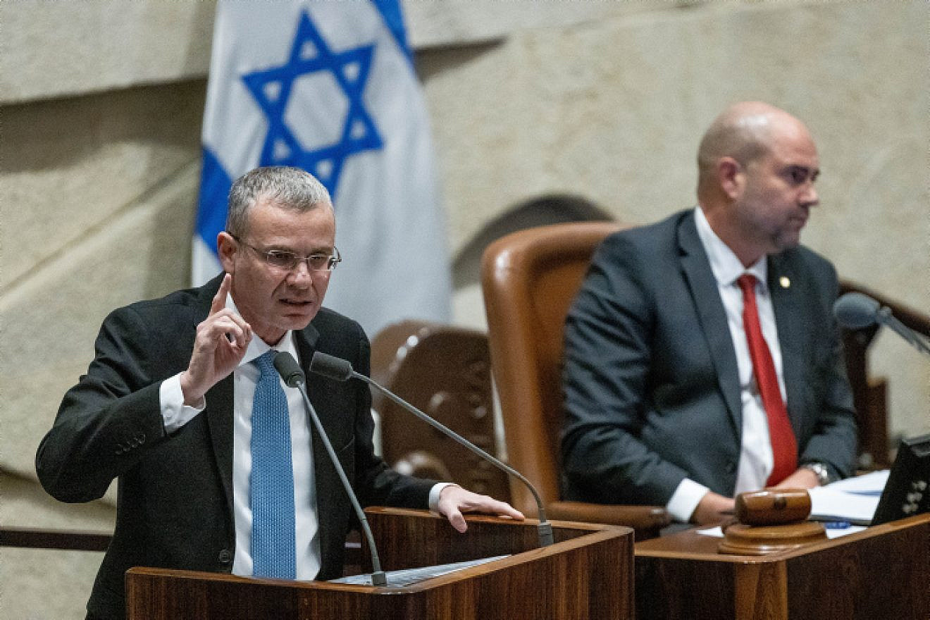 <p>Israeli Justice Minister Yariv Levin (left) addresses the Knesset during a debate on the government's judicial reform program in February 2023. He said that the Bar association membership fee funds are used for political purposes that have nothing to do with the benefit of all lawyers. YONATAN SINDEL/FLASH90.</p>