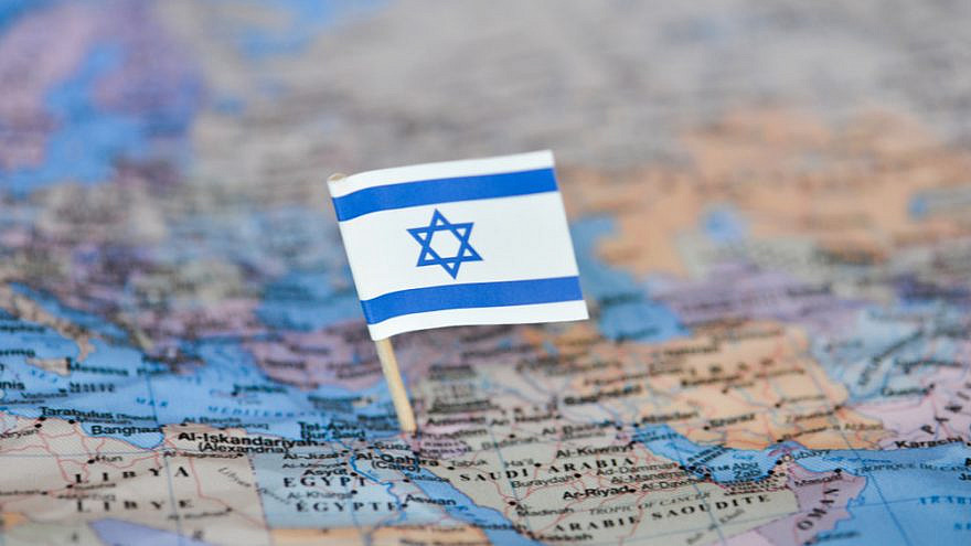 <p>Map with the flag of Israel. On eve of Rosh Hashanah, Jewish population rises to 15.7 million worldwide. VREZH GYOZALYAN/SHUTTERSTOCK</p>