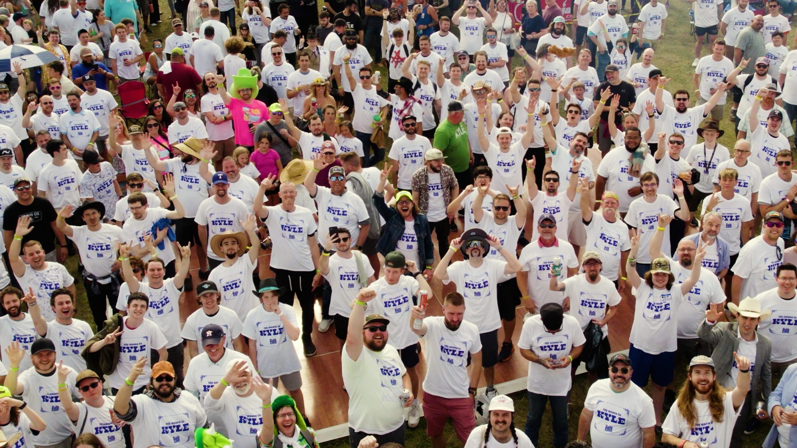 A crowd of men wearing “Kyle” t-shirt representing the city of Kyle, Texas. The city of Kyle attempted to break the record of gathering men with name Kyle. CITY OF KYLE/SWNS TALKER