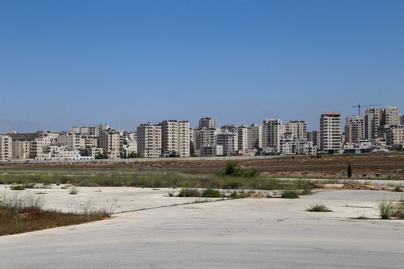 <p>Kafr Aqab and the abandoned Atarot Airport, north of Jerusalem, July 31, 2022. The targeted school, named Ilya, is one of four new educational institutions in Kafr Aqab funded by the Jerusalem Municipality, that will prepare students for an Israeli high school matriculation diploma. GERSHON ELINSON/FLASH90.</p>