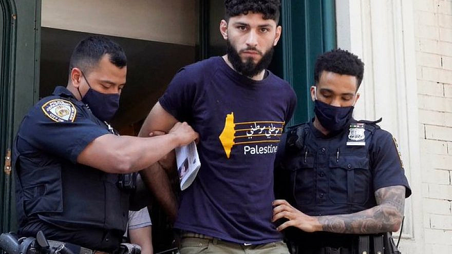 <p>Waseem Awawdeh in custody of the New York Police department. Awawdeh was arrested for beating a Joseph Borgen after confessing to authorities for his motivation beating him down while wearing a yarmulke. CANARY MISSION/JNS</p>