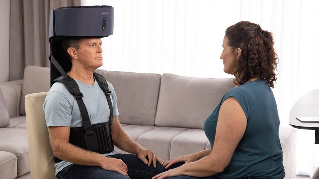A patient in a stroke recovery trial using the BrainQ neuro rehab system. Six Israeli designs are lined up in the Fast Company Next Big Things list. BRAINQ.