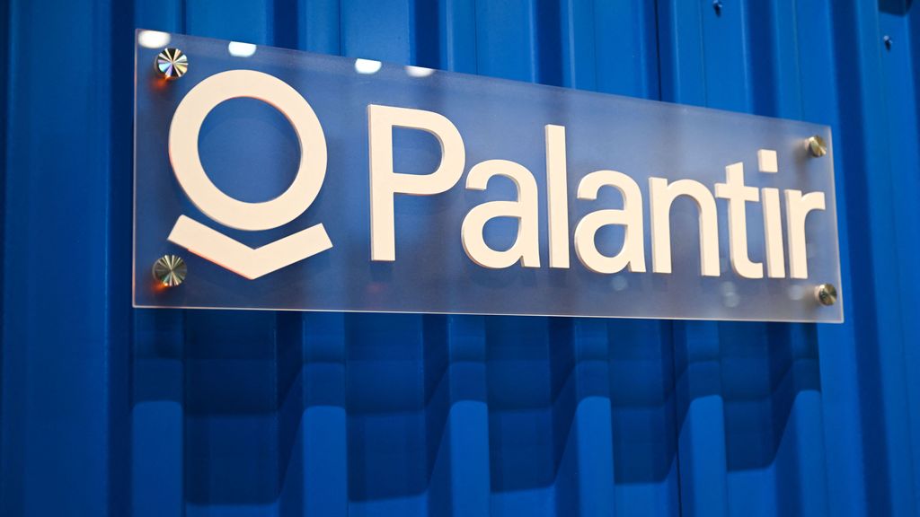 The Palantir Technologies logo is displayed on a shipping container at the companys booth during the Consumer Electronics Show (CES) in Las Vegas, Nevada on January 5, 2023. PATRICK T. FALLON/BENZINGA