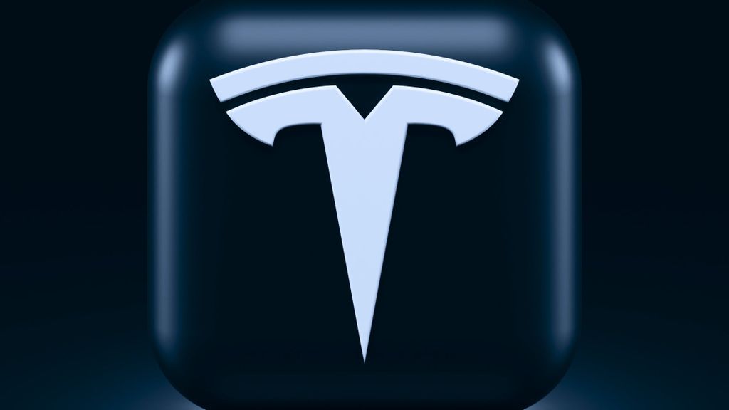 Photo of the Tesla logo. Teardown Analysis Reveals Tesla Cybertruck's Weight Advantage Over Rivian Automotive and General Motors. ALEXANDER SHATOV/UNSPLASH.