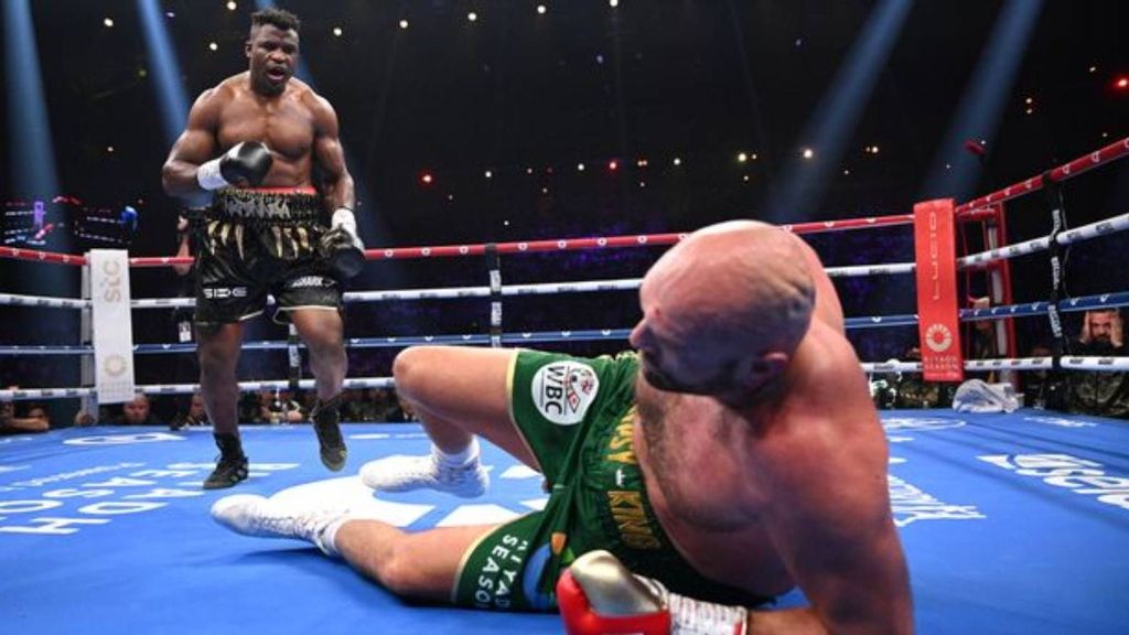 <p>Francis Ngannou knocks down Tyson Fury during the Heavyweight fight between Tyson Fury and Francis Ngannou at Boulevard Hall. Joshua Can't Take My Power, says Ngannou laying out his game plan for the fight on March 8 in Riyadh, Saudi Arabia. JUSTIN SETTERFIELD/GETTY IMAGES.</p>