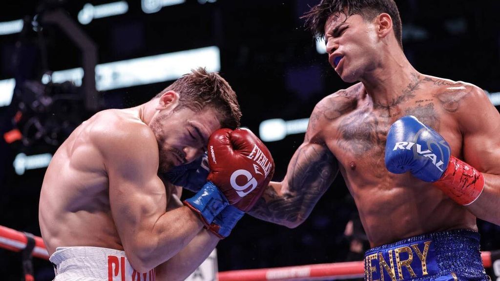 <p>Ryan Garcia(R) exchanges punches with Oscar Duarte during their welterweight fight at Toyota Center in Houston, Texas. Ryan Garcia has beef with pop star Billie Ellish. CARMEN MANDATO/GETTY IMAGES. </p>