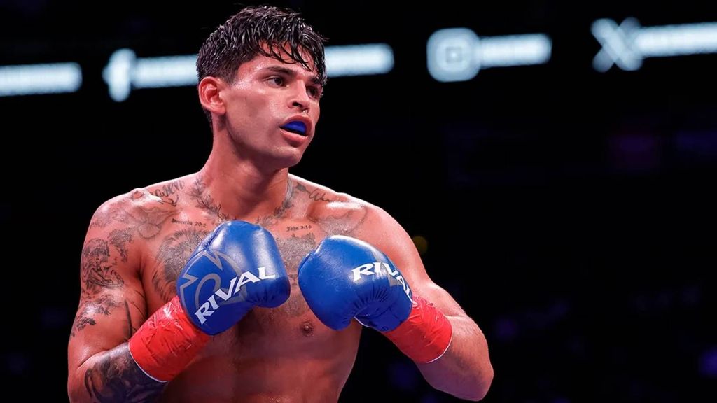 <p>Ryan Garcia looks on while facing Oscar Duarte during their welterweight fight at Toyota Center in Houston, Texas. Ryan Garcia offers his surprising views on women. CARMEN MANDATO/GETTY IMAGES.</p>