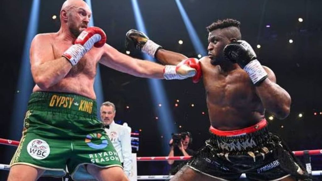 Tyson Fury punches Francis Ngannou during the Heavyweight fight between at Boulevard Hall in Riyadh, Saudi Arabia. Tyson Fury’s watch collection ranked by chronofinder. JUSTIN SETTERFIELD/GETTY IMAGES.