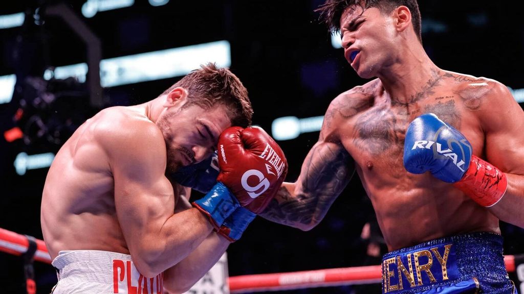 Ryan Garcia exchanges punches with Oscar Duarte during their welterweight fight at Toyota Center in Houston, Texas. Ryan Garcia has revealed his new relationship with Mikaela Testa. CARMEN MANDATO/GETTY IMAGES.