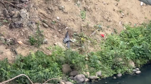 嬰仔死體予人擲落大排 警方:爸母無固定住所