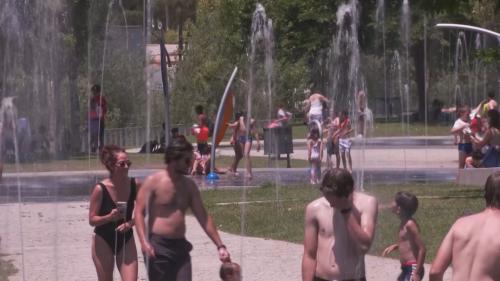 西班牙首都.南部高溫衝到40度 民眾耍水退暑氣