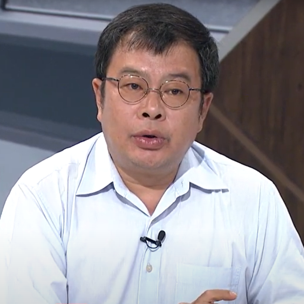何明修