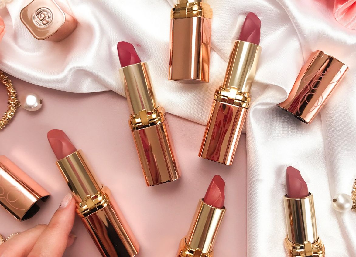 L'Oréal lipsticks on satin sheet background, an example of promotional print assets managed by the Altavia productivity platform