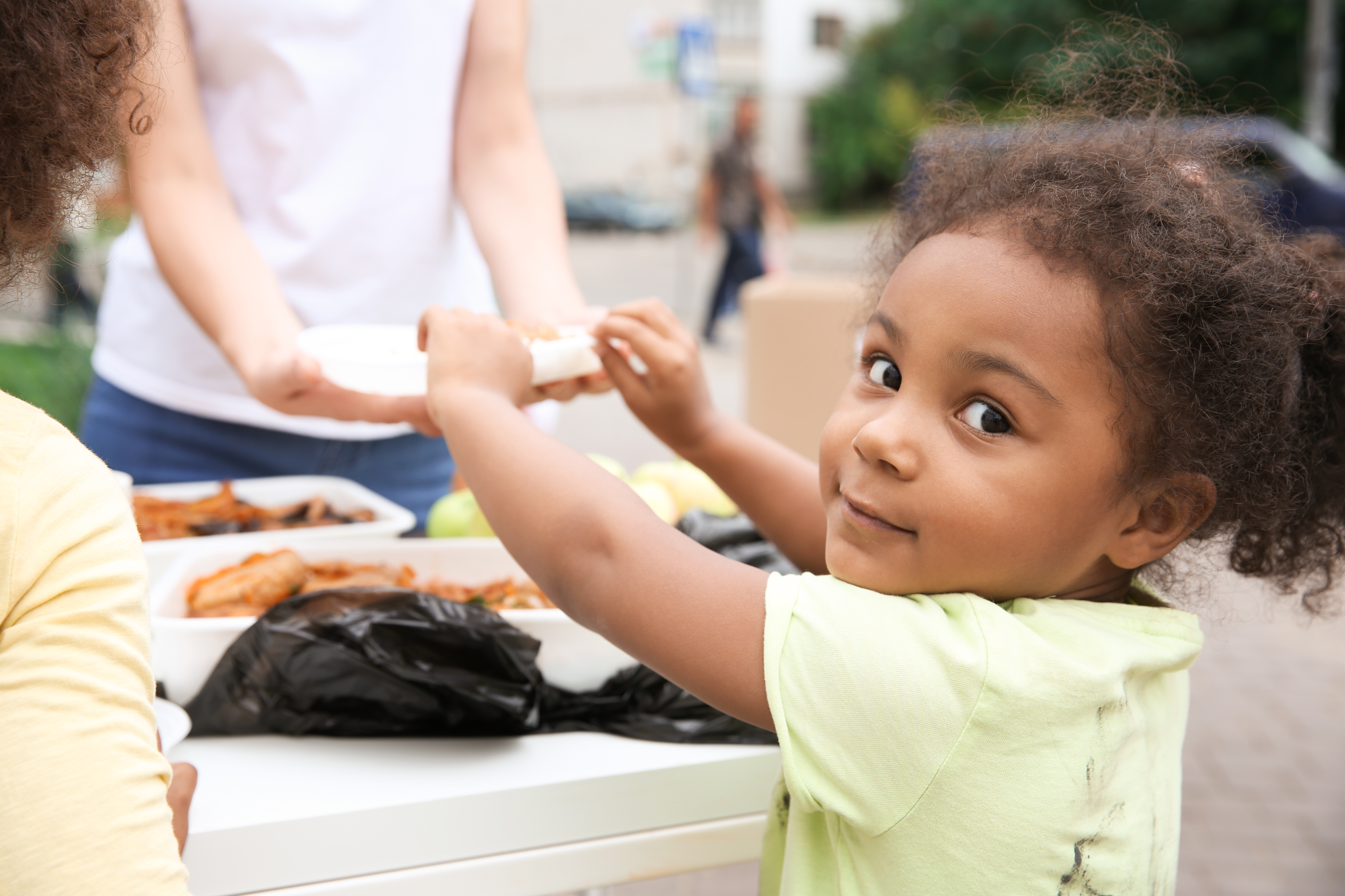 Kid Receiving Food