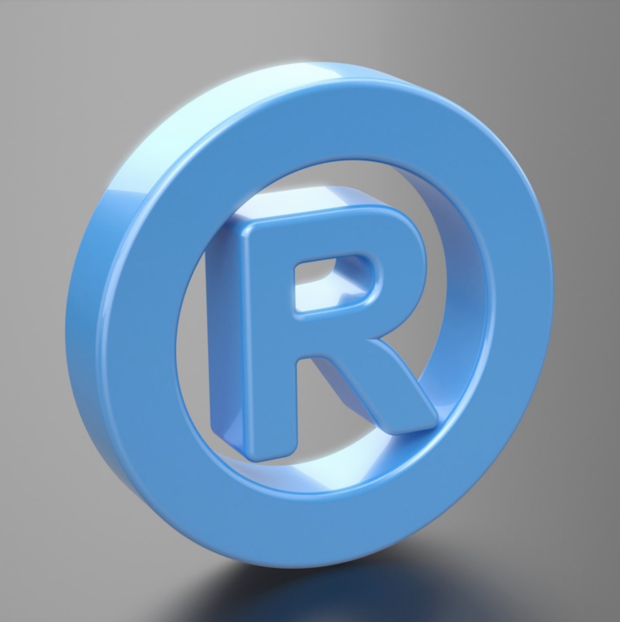 trademark symbol in blue circle