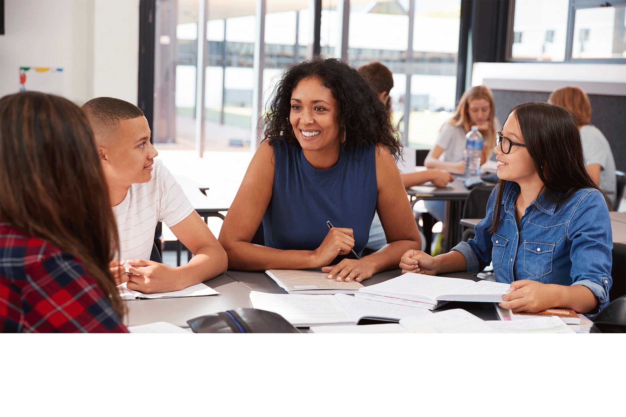 A diverse group of students engages in a collaborative discussion