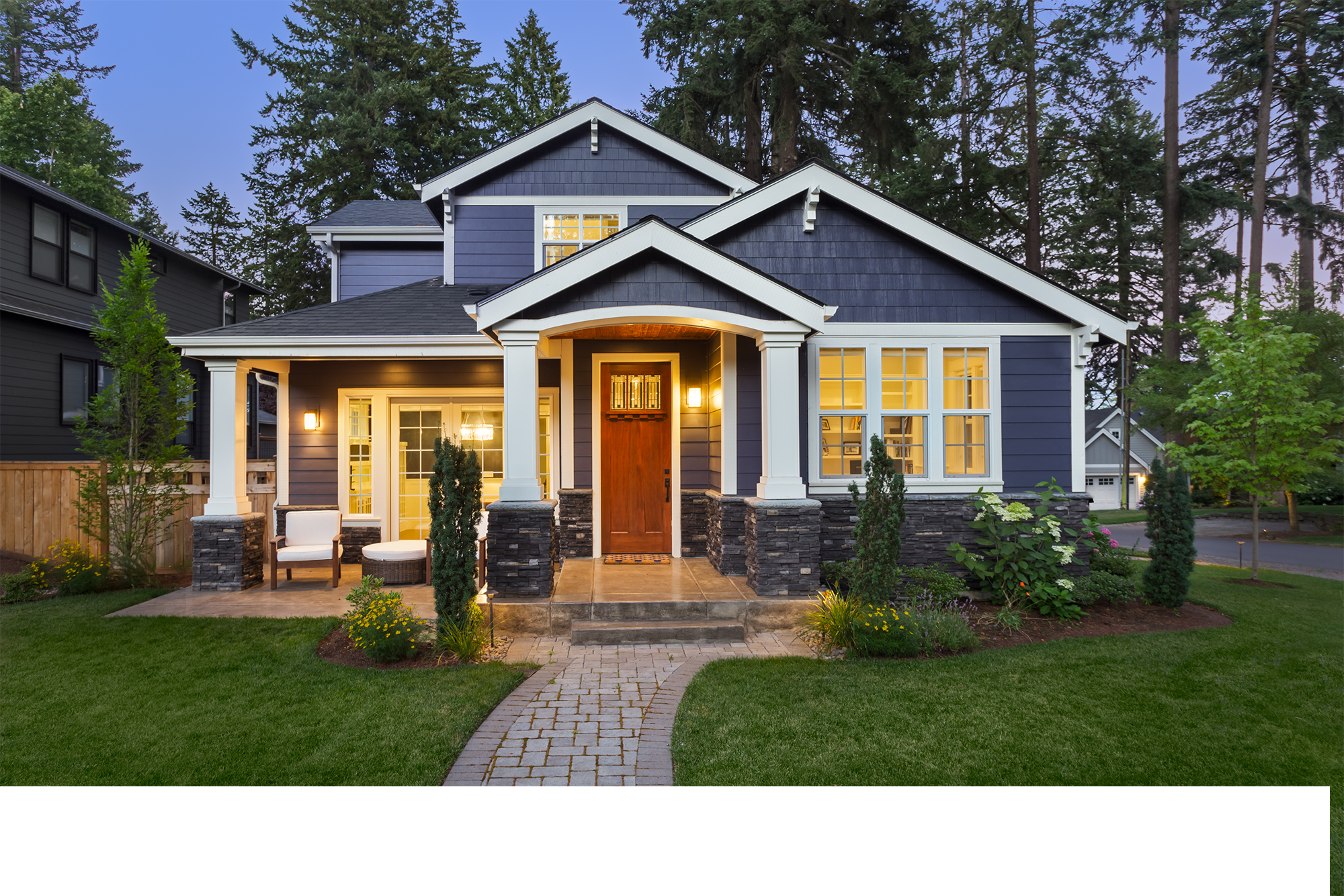 Charming blue house with a welcoming porch