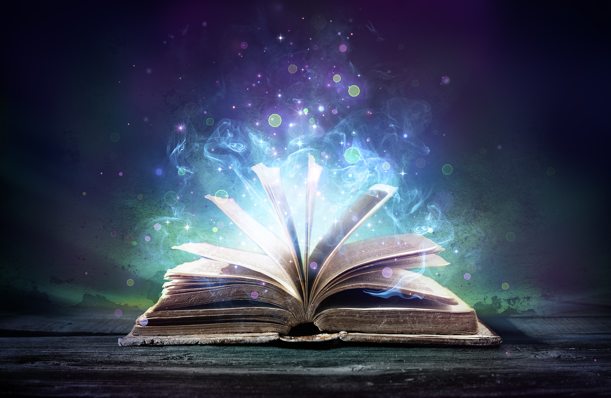 open book with shining light effect